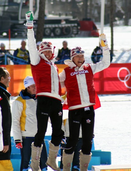 Canada's Beckie Scott (right) and Sara Rennner receiving their silver medal in the team sprint at the 2006 Olympics in Torino, Italy.