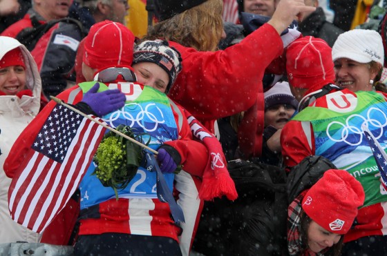 Demong (l) and teammate Todd Lodwick (right) get congratulations from friends and family after winning silver in the team event at the Olympics