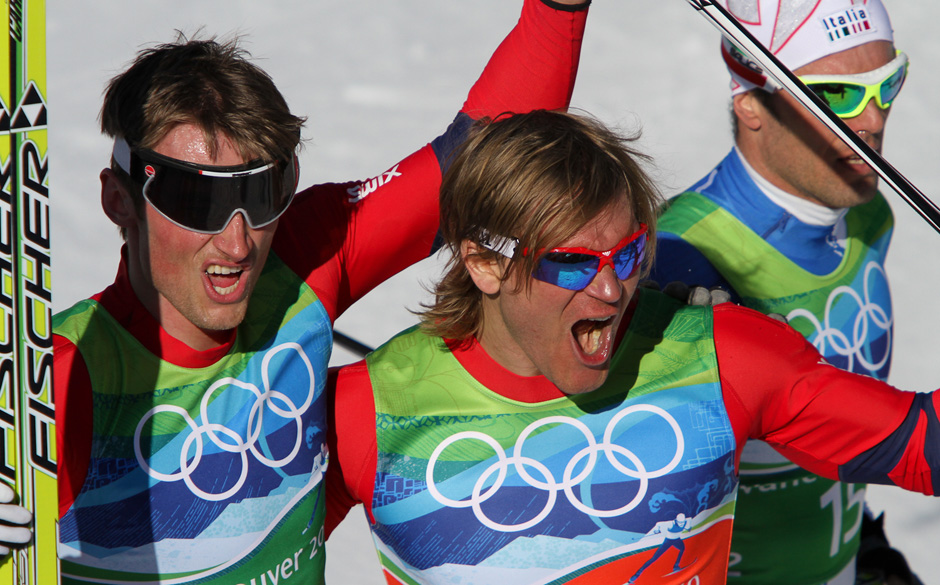Petter Northug and Oystein Pettersen celebrate their gold medal in the 2010 Olympic sprint relay.