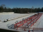 Athletes and coaches in the range on Thursday morning before the sprint.