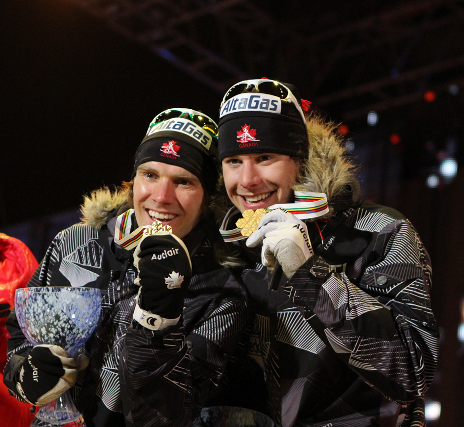 Devon Kershaw (L) and Alex Harvey (R) with their World Championship gold medals