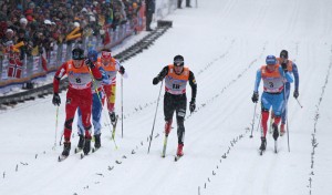 Simi Hamilton in a close battle during his quarterfinal heat.  Photo: Fischer/Nordic Focus.