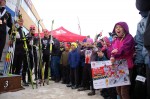 Young fans cheer for the men's 50 k classic podium at the 2012 Canadian Ski Nationals on March 24.