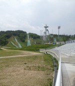 The PyeongChang ski jumps, from the cross-country stadium. Photo: Dave Jarrett.