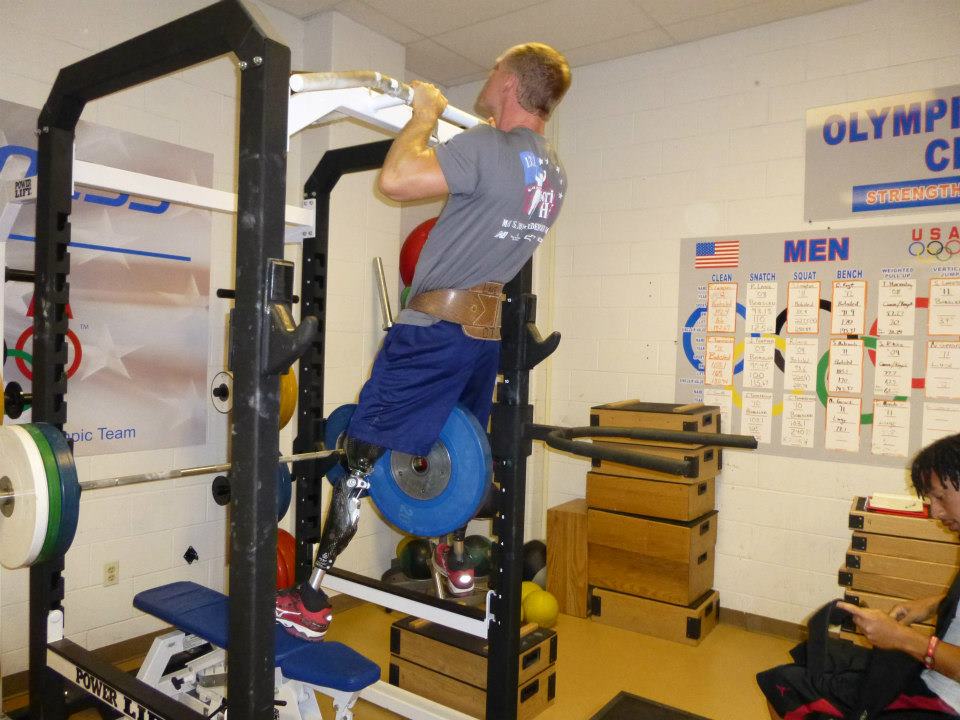 Lt. Dan Cnossen of the U.S. Paralympics Nordic National Team doing loaded pull-ups during a strength session at the Lake Placid Olympic Training Center. (Photo: www.facebook.com/USParalympicsNordic)