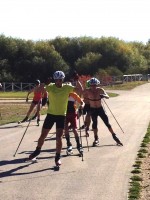 U.S. Nordic Ski Team member Tad Elliott (tucked behind leader Bill Demong) works out with the U.S. Nordic Combined Team earlier this week at Soldier Hollow in Midway, Utah. (Dave Jarrett photo)