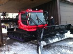 West Yellowstone chief groomer Doug Edgerton sits in his PistenBully with summer tracks while talking to Steve Hoovler, assistant director of the Yellowstone Ski Festival, after grooming South Plateau early Nov. 22.