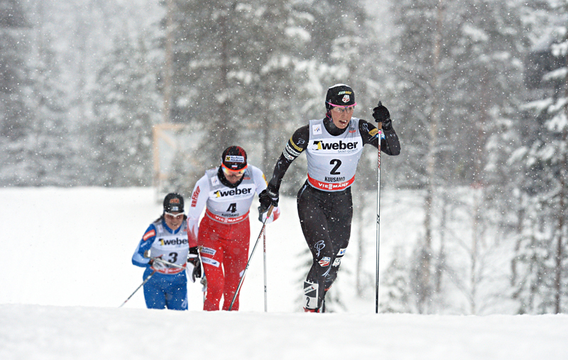 Kikkan Randall (USA) leads Justyna Kowalczyk (POL) and Krista Lahteenmaki (FIN),  during the women's pursuit on the final day of the Kuusamo (FIN) mini-tour.  Photo: Fischer/Nordic Focus.