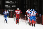 The lead group of the men's 15 k pursuit. Photo: Fischer/Nordic Focus.