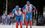 Russian Maxim Vylegzhanin (bib 8) on his way to 15 k classic pursuit victory in the second stage of the 2012/2013 Tour de Ski on Sunday in Oberhof, Germany. It was his first World Cup stage win. Photo: Marcel Hilger.