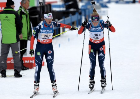 Team player: Studebaker tags off to Hannah Dreissigacker during a World Cup relay in 2013. Photo: USBA/Nordic Focus.