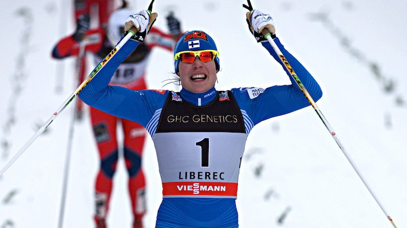 Mona-Liisa Malvalehto of Finland celebrates her first World Cup victory and podium at the classic sprint in Liberec, Czech Republic, in 2013. (photo: FIS Cross Country)