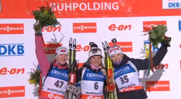 (l-r) Darya Domracheva of Belarus, Miriam Gossner of Germany, and Kaisa Makarainen of Finland on the podium of the World Cup sprint in Ruhpolding on Friday. An early starter, Gossner held her lead all evening.