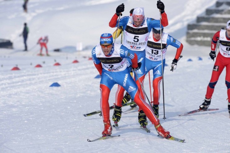 Dmitry Rostovtsev (RUS) leading his teammates through the skate portion of the junior mens skiathlon. He led a Russian sweep of the podium on Friday at Junior World Championships. Photo: Liberec2013.