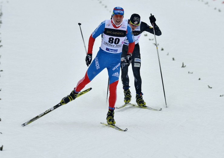 Sergey Ustiugov (RUS) en route to winning the men's 15 k freestyle at U23 World Championships in Liberec, Czech Republic. Photo: Liberec2013.