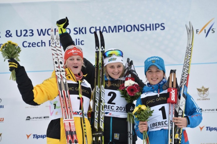 The women's classic sprint podium. 1. Stina Nilsson (SWE) 2. Victoria Carl (GER) 3. Evgenia Oschepkova (RUS). Photo: Liberec2013.