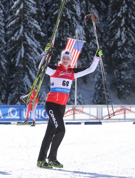 Beaudry celebrating fifth place in the youth sprint at 2013 World Youth and Junior Championships in Obertilliach, Austria. (Photo: Hugh Harden)