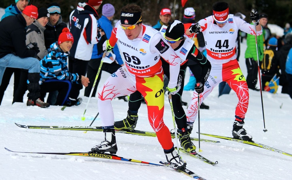 Ivan Babikov (l) leads fellow Canadian Graham Nishikawa (r) of the Alberta World Cup Academy during Wednesday's 15 k freestyle individual start at 2013 World Championships in Val di Fiemme, Italy.