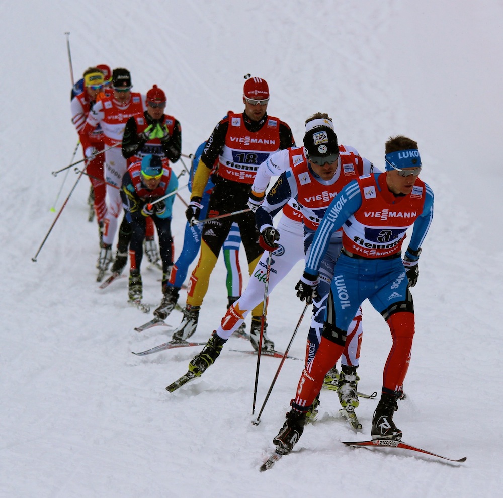 Russia's Nikita Kriukov leads a 10-man pack, including Canadian Alex Harvey in eighth, in Sunday's 6 x 1.5 k freestyle team sprint at 2013 World Championships in Val di Fiemme, Italy.