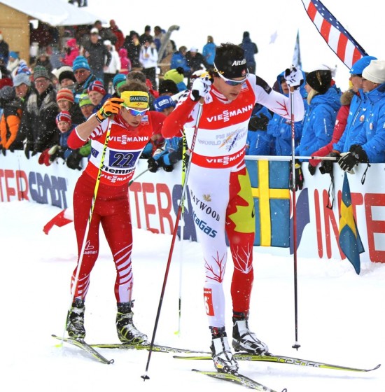 Defending team sprint champ Alex Harvey of Canada leads Austria's Bernhard Tritscher in Sunday's 6 x 1.5 k freestyle team sprint final at the 2013 World Championships in Val di Fiemme, Italy.