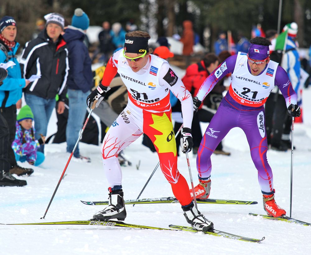 Canadian World Cup Team member Devon Kershaw (l) leads Japan's Akira Lenting up one of several climbs in the World Championships 15 k freestyle individual start on Feb. 27 in Val di Fiemme, Italy. Kershaw went on to place 33rd.