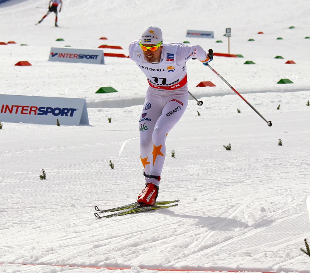 Sweden's Johan Olsson pushing to the finish of Wednesday's 15 k freestyle individual start at the 2013 World Championships in Val di Fiemme, Italy. Olsson took second, 11.8 seconds behind Norway's Petter Northug.