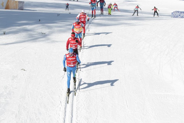 Athletes train on course during the final training day at 2013 World Championships in Val di Fiemme, Italy. Photo: Fiemme 2013.