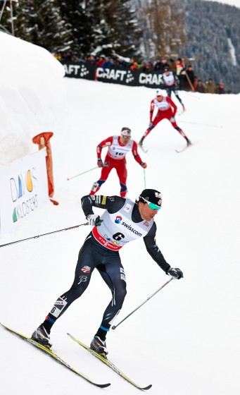 American Andy Newell leads Norwegians Kent Ove Clausen (c) and Amund Lid Byggland (in third) down a hairy descent in the Davos World Cup classic sprint quarterfinal in Switzerland on Saturday. Newell comfortably won the heat, while teammate Simi Hamilton (in back) did not advance in third. (Photo: Fischer/Nordic Focus)