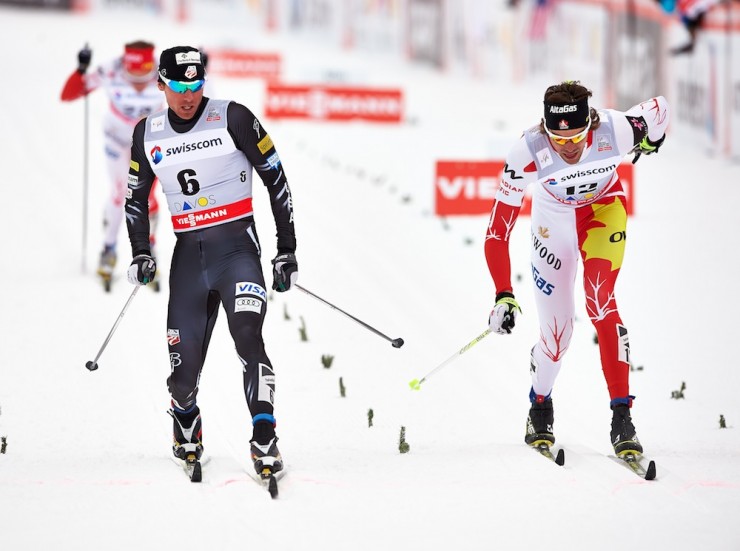 American Andy Newell (l) captures second in a World Cup semifinal just 0.25 seconds ahead of Canada's Lenny Valjas in Saturday's 1.5 k classic sprint at the Davos World Cup in Switzerland. Valjas advanced to the final with a fast-enough time, and ultimately placed sixth. Newell was fourth in the final. (Photo: Fischer/Nordic Focus)