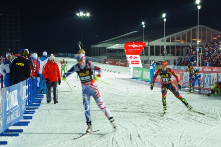 Marie Dorin Habert of France leading Gabriela Soukalova of the Czech Republic.