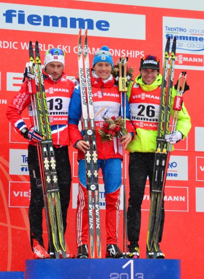 2013 World Championships classic sprint winner Nikita Kriukov (RUS) with Norwegian runner-up Petter Northug (l) and Canadian bronze medalist Alex Harvey (r). (Photo: Glen Crawford) 
