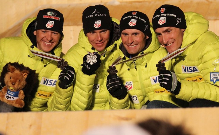 From left to right: Todd Lodwick, Billy Demong, Bryan Fletcher and Taylor Fletcher with their bronze medals from Sunday's team event at the 2013 Nordic Combined World Championships in Val di Fiemme, Italy. (Photo: Fiemme2013)