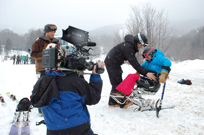 Camera crews film as Kelly Brush Davisson gets ready to ski at Sugarbush Resort in Warren, Vt. on 2-23-13. Brush Davisson will be featured in an upcoming Human Highlight Reel on CBS that is scheduled to air at 3:30 p.m. on April 6 during the NCAA men's basketball tournament Final Four.