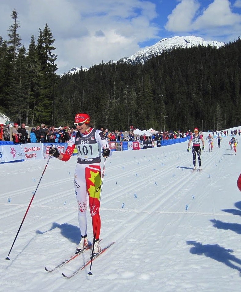 Dasha Gaiazova smiles as she cruises across the finish in first, claiming her second-straight title at 2013 Canadian Nationals in Thursday's 1.4 k classic sprint in Whistler, B.C.