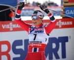 Norway's Marit Bjorgen celebrates her fourth gold and fifth medal of the 2013 World Championships after winning Saturday's 30 k classic mass start in Val di Fiemme, Italy. She hadn't won the ultimate distance event at a World Championships since 2005.