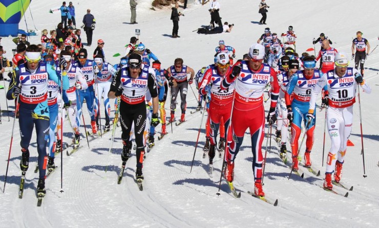 Leading up the first hill in Sunday's 50 k mass start at 2013 World Championships (from left to right), Kazakhstan's Alexey Poltoranin, Switzerland's Dario Cologna, Norway's two-time defending champ Petter Northug and Sweden's Johan Olsson. The Swede went on to ski alone for nearly 30 kilometers and win his first individual gold by 12.9 seconds over Cologna.
