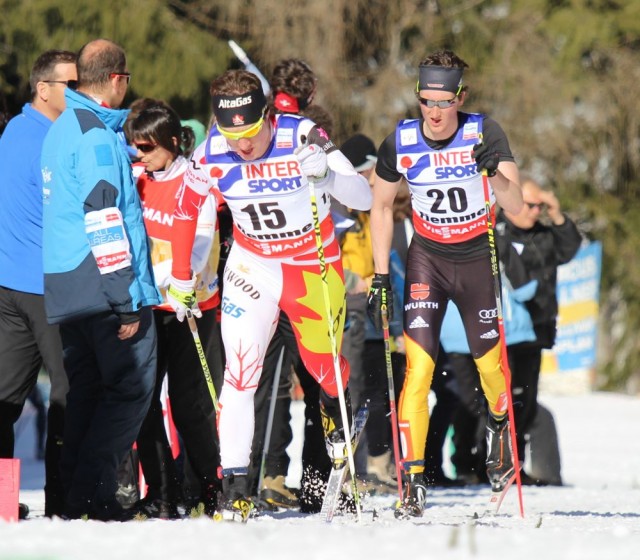 Canadian Ivan Babikov leads Germany's Andy Kuehne in Sunday's 50 k classic mass start at the 2013 World Championships in Val di Fiemme, Italy. Babikov did not finish after pulling out after 25 k.