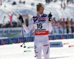Sweden's Johan Olsson celebrates his victory in Sunday's 50 k classic mass start at the 2013 World Championships in Val di Fiemme, Italy. It was his first individual gold and Sweden's first at this year's championships.