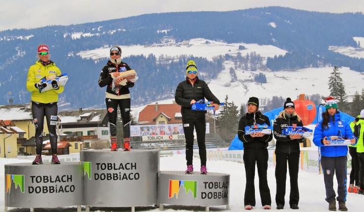 Bjornsen, left, on the podium with race-winner Sandra Ringwald and bronze-medalist Alenka Cebasek (SLO). Photo: Bryan Fish.
