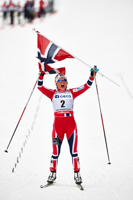 Norway's Therese Johaug celebrates her victory in  Sunday's 30 k freestyle mass start at Holmenkollen at the World Cup in Oslo, Norway. She beat Poland's Justyna Kowalczyk by 46.6 seconds to repeat her victory from the same race at the 2011 World Championships at the same venue. (Photo: Fischer/Nordic Focus)