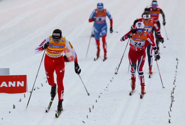 Justyna Kowalczyk (POL) sprints for the finish in Drammen, Norway, to both win the race and secure the overall World Cup crystal globe. Photo: Fischer/Nordic Focus.