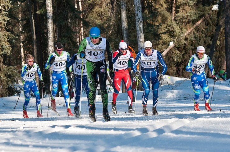 Zak Ketterson (Midwest/Loppet Nordic Racing) leads the J2 boys 5 k classic mass start on Saturday at 2013 Junior Nationals in Fairbanks, Alaska. (Photo: bertboyer.zenfolio.com. Proceeds go to NNF)