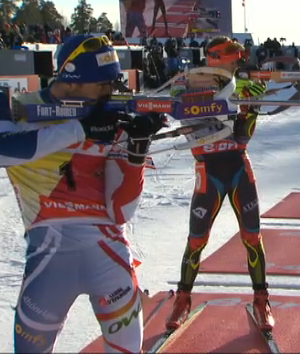 Fourcade and Moravec shooting head to head in the final stage. 