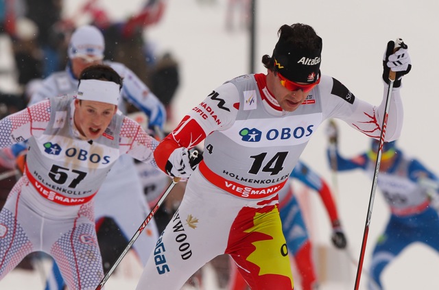 Canadian Alex Harvey leads Andrew Musgrave of Great Britain in Saturday's 50 k freestyle mass start at the World Cup in Holmenkollen, Oslo, Norway. Harvey stopped after the fourth of six laps and did not finish, and Musgrave placed 56th of 60. (Photo: Fischer/Nordic Focus)