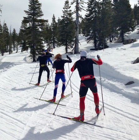 Athletes climb to the high point of the prologue course at the Auburn Ski Club.