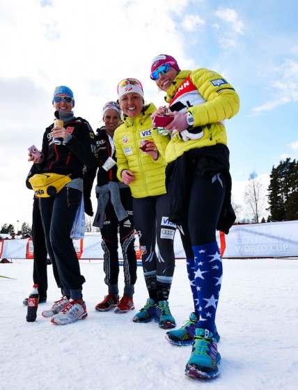 U.S. athletes Holly Brooks and Kikkan Randall with a German skier at the Falun, Sweden, awards ceremony last Sunday. Photo: Fischer/Nordic Focus.