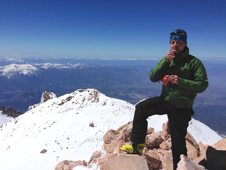 Former Bridger Ski Foundation and U.S. Ski Team member Leif Zimmerman enjoying a snack on top of Mount Shasta, an active volcano and fifth-highest peak in California, in April. Zimmermann retired from skiing this spring. (Courtesy photo)
