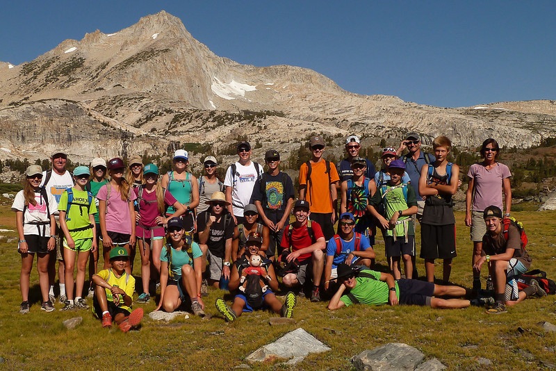 posing before splitting up into two groups to climb North Peak (in the background). Plus our added "alumni" to make the hike extra special. The 2013 Far West Nordic June Lake Camp, led by Nancy Fiddler, Mark Nadell, and Marie French with a stellar support crew of Mike Mcelravey and Steve Twomey. Athletes included Carson Bold, Laurel Fiddler, Connor Kusumoto, Phillip Oxford, Cameron Small, Cody Atwood, Piper Joubert, Quinn Lehmkuhl, Jane Nall, JC Schoonmaker, Camille Syben, Lindsay Twomey, Cameron Valois, Ryland Belisle, Savannah Blide, Markus Brun, Peter Carroll, Tyler Ferrera, Chloe Gorman, Bri Parker, and Sam Zabell (and, of course, Curious George). Plus a special appearance on our hiking day from Far West alumni Alex Kopytko, Branden Deeter, and Grayson Forsberg. Activities included hiking, ski walking, classic and skate rollerskiing, climbing North Peak, LOTS of beach and rope swing time at the lakes, and many other shenanigans, of course. They came back tired, guaranteed. (If you notice certain faces more than others, it's because they wouldn't get out of the way of the camera. #skihams.) (Photo: Mark Nadell/macbethgraphics.com)