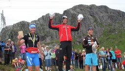 Curdin Perl (SUI) celebrates atop the podium after winning the 7.5-kilometer hill climb at the Blink rollerski festival in Lysebotn, Norway on Thursday. (Christian Stahl- on FIS website)