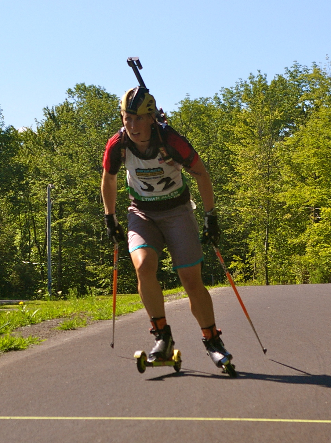 Tracy Barnes (Twin Biathletes) finishing third in the 10 k pursuit at 2013 North American Biathlon Rollerski Championships in Jericho, Vt.
